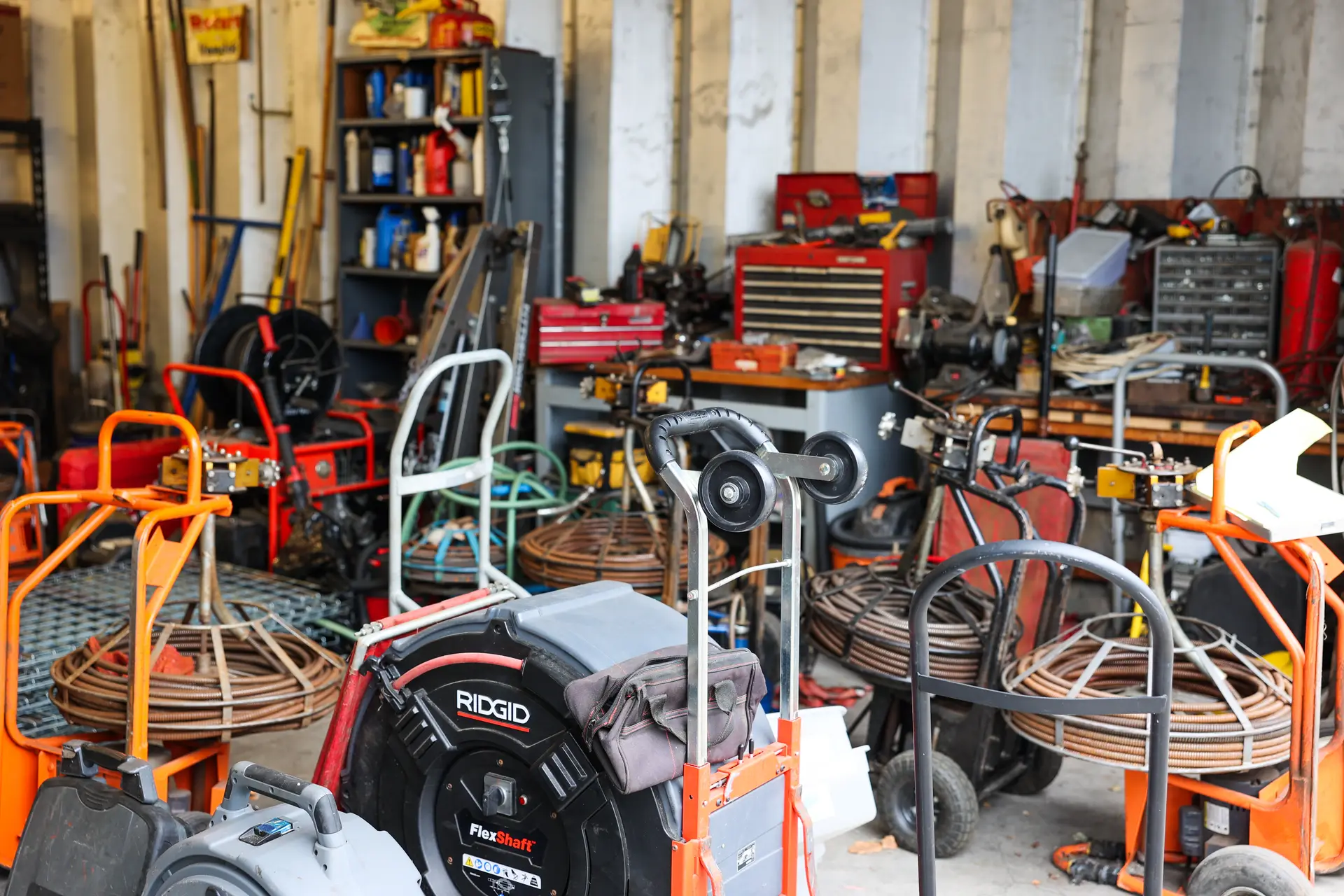 Commercial drain cleaning equipment ready for service at the Drain Doctors Plumbing shop