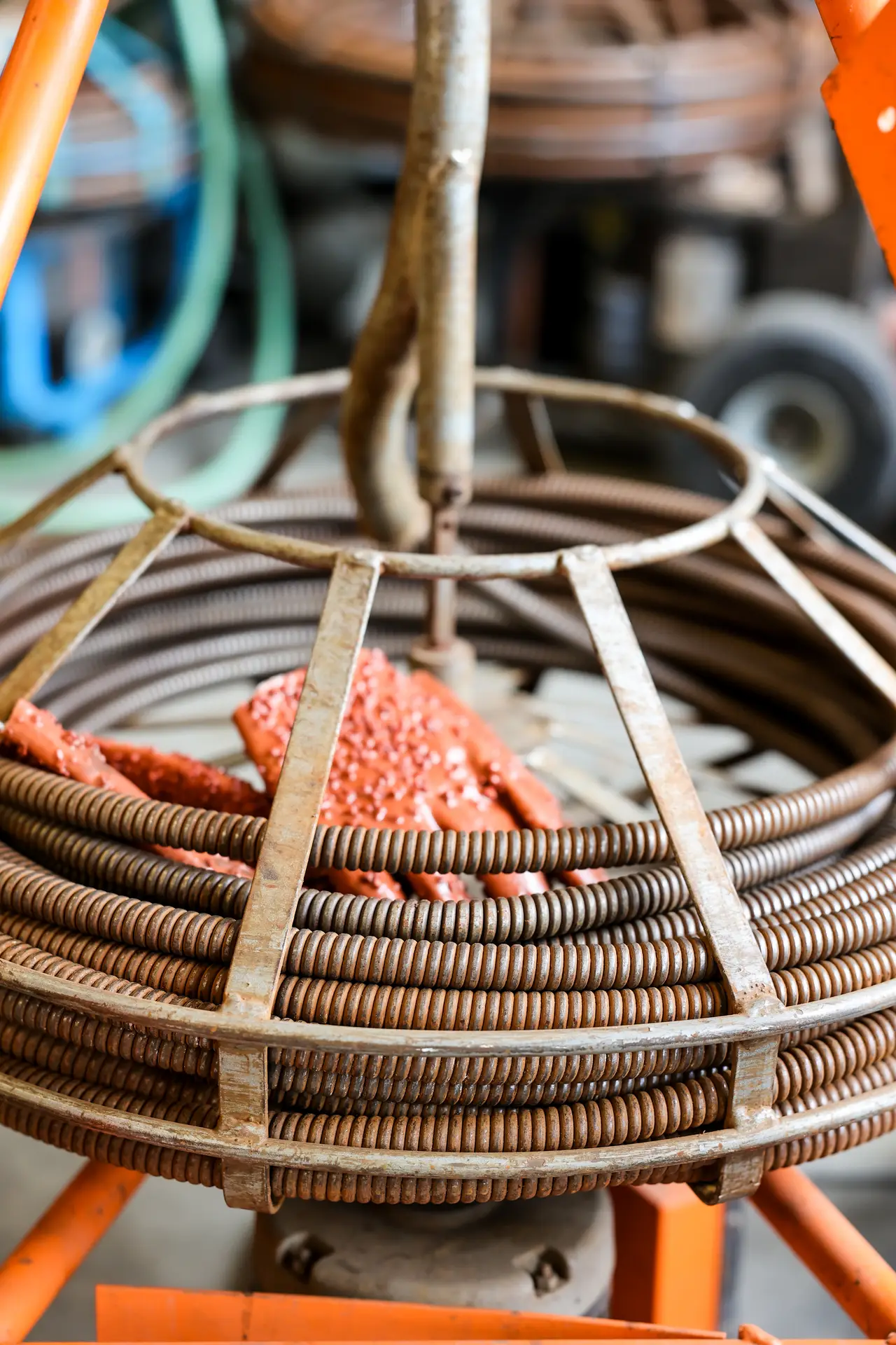 Close-up of a drain snake cable used to clear clogged drains