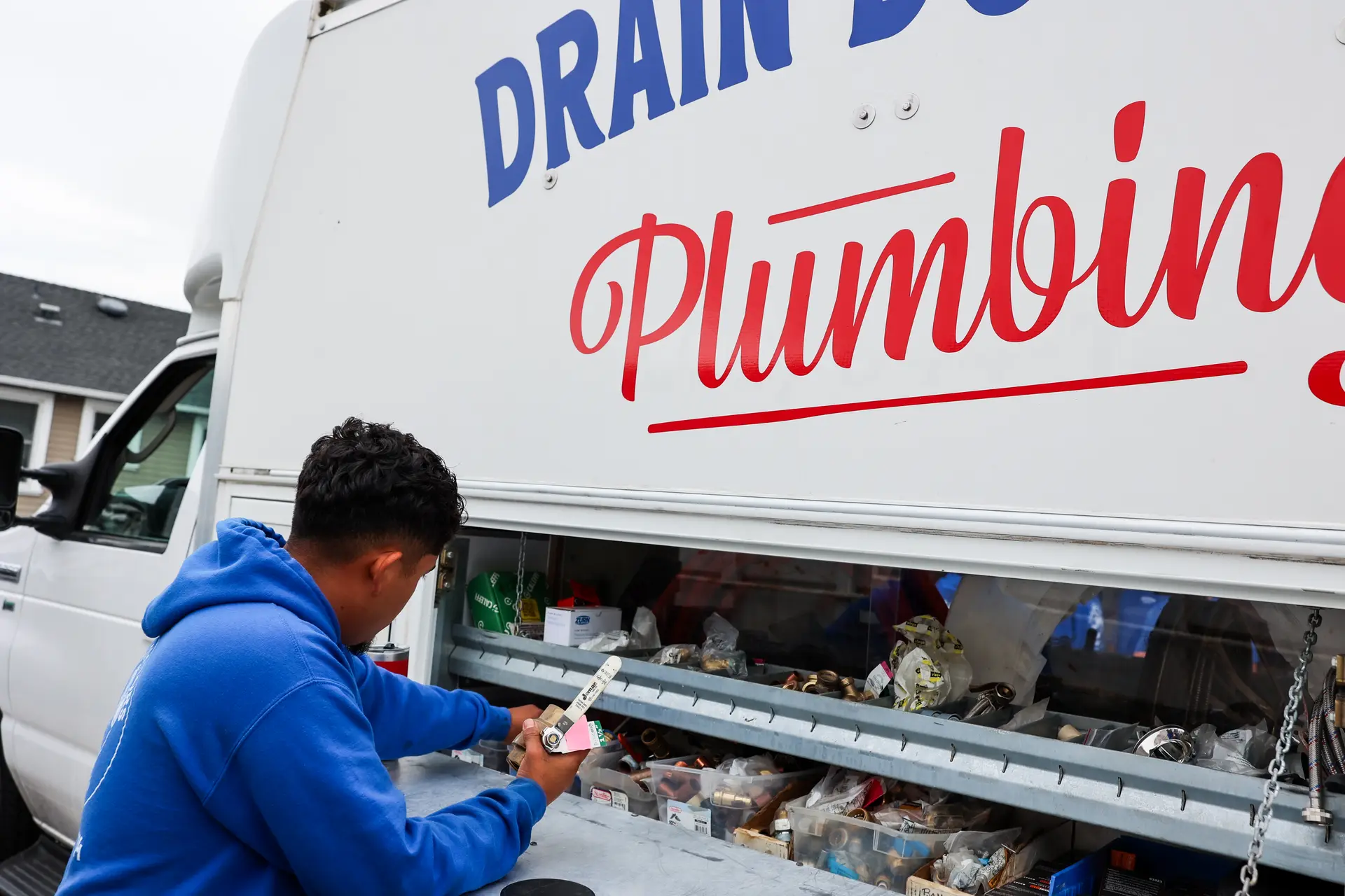 Drain Doctors Plumbing technician preparing for a job in Grover Beach, CA