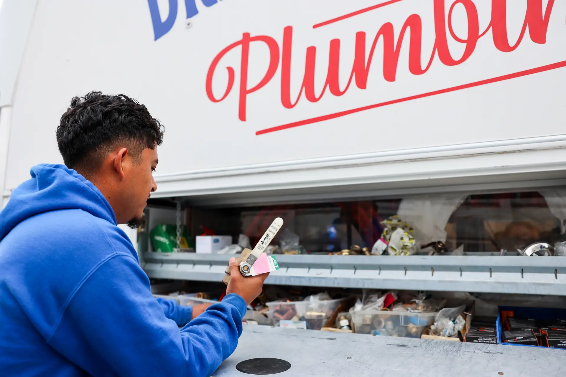 Drain Doctors Plumbing technician preparing for a job in Arroyo Grande, CA