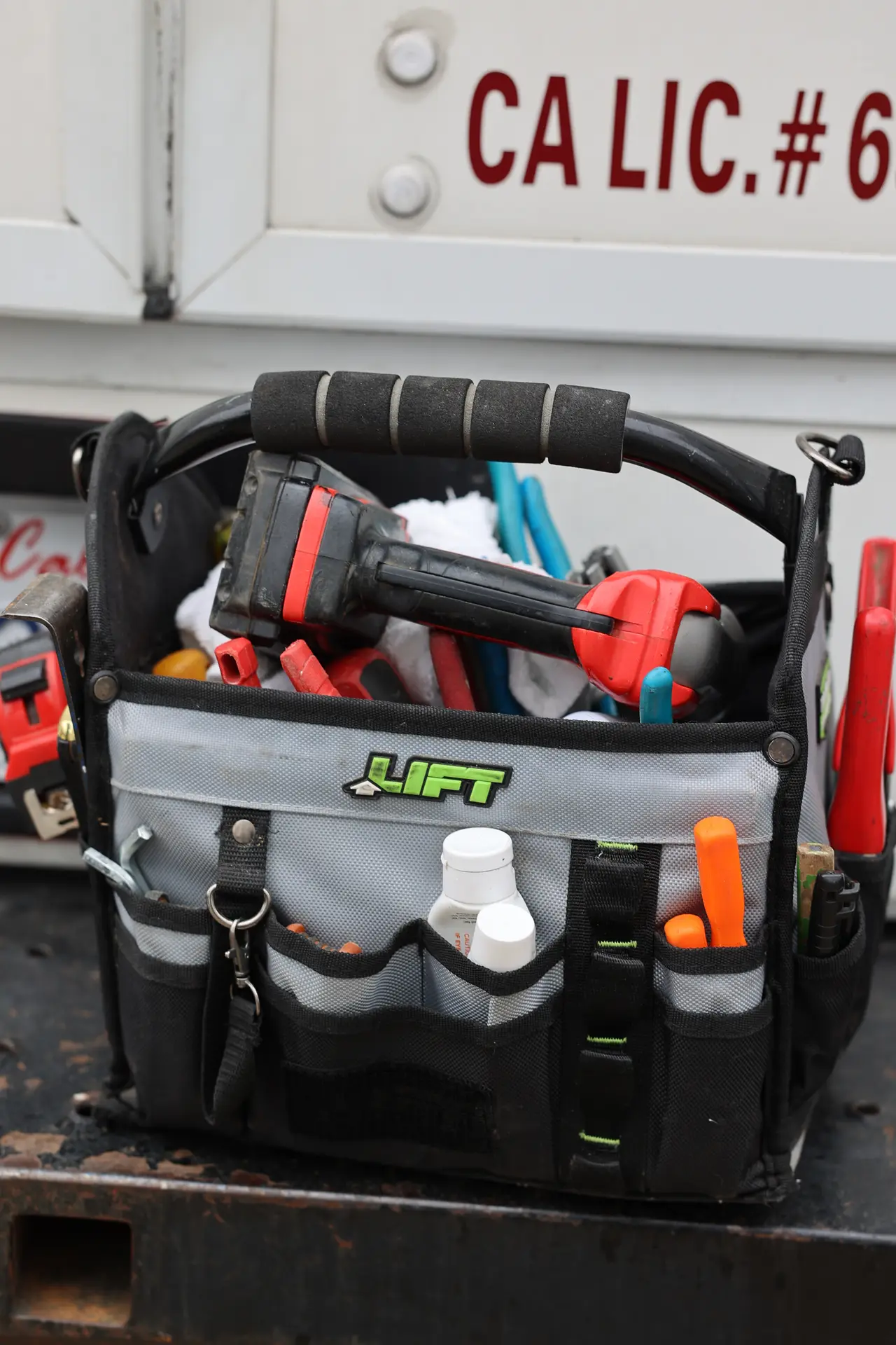 Drain Doctors Plumbing technician preparing equipment in San Luis Obispo, CA